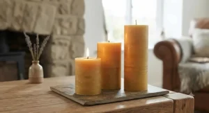 Elegant hand-poured beeswax pillar candles providing a warm, golden glow and natural air purification for your living space.